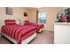 Bedroom with two twin beds and lake view at 3045 Beach Palm Ave, Kissimmee, FL 34747