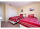Bedroom with two twin beds and a closet at 3045 Beach Palm Ave, Kissimmee, FL 34747