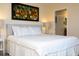 Spacious bedroom with a king-size bed and ensuite bathroom at 3045 Beach Palm Ave, Kissimmee, FL 34747