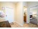 Bright entryway with a view of the bathroom and another bedroom at 3045 Beach Palm Ave, Kissimmee, FL 34747