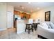 Kitchen with stainless steel appliances and breakfast bar at 3045 Beach Palm Ave, Kissimmee, FL 34747