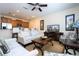 Living Room with comfortable seating and kitchen view at 3045 Beach Palm Ave, Kissimmee, FL 34747