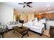 Living Room with sectional sofa and kitchen at 3045 Beach Palm Ave, Kissimmee, FL 34747