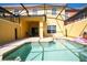 Private pool and patio with seating area at 3045 Beach Palm Ave, Kissimmee, FL 34747