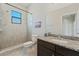 Clean bathroom with granite countertop and walk-in shower at 310 Lake Mariana Pl, Auburndale, FL 33823