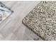 Close up of speckled granite kitchen countertop at 310 Lake Mariana Pl, Auburndale, FL 33823