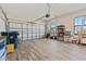 Spacious garage with ample storage and wood-look flooring at 310 Lake Mariana Pl, Auburndale, FL 33823