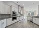 Spacious kitchen with stainless steel appliances and granite countertops at 310 Lake Mariana Pl, Auburndale, FL 33823