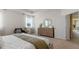 Bright bedroom with plush bedding and ample closet space at 3215 Arch Ave, Ormond Beach, FL 32174