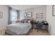 Baseball-themed bedroom with a built-in desk at 3215 Arch Ave, Ormond Beach, FL 32174