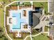 Aerial view of a community pool, showcasing its refreshing water and inviting space for relaxation and social gatherings at 3215 Arch Ave, Ormond Beach, FL 32174