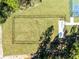 Aerial view of a community dog park offering a safe fenced space for neighborhood pets to exercise and socialize at 3215 Arch Ave, Ormond Beach, FL 32174