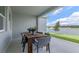 Relaxing patio overlooking a serene lake view at 3215 Arch Ave, Ormond Beach, FL 32174