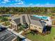 Community clubhouse with pool, playground, and tennis at 3221 Arch Ave, Ormond Beach, FL 32174