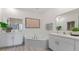 Spa-like bathroom with double vanity and corner tub at 3221 Arch Ave, Ormond Beach, FL 32174