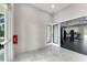 Community center doorway leading to a fully-equipped modern fitness center at 3221 Arch Ave, Ormond Beach, FL 32174