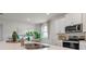 Modern kitchen with white cabinets and a double sink at 3221 Arch Ave, Ormond Beach, FL 32174