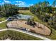 playground with slides and play structures at 3221 Arch Ave, Ormond Beach, FL 32174