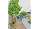 Backyard with patio, landscaping, and a variety of plants at 3250 Dellbrook Dr, Deltona, FL 32738