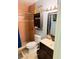 Bathroom featuring vanity, toilet, and shower with tiled walls at 3250 Dellbrook Dr, Deltona, FL 32738