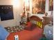 Bedroom featuring a bed, furniture, and decor at 3250 Dellbrook Dr, Deltona, FL 32738