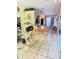 Open-concept living area with a view of the kitchen and breakfast bar at 3250 Dellbrook Dr, Deltona, FL 32738