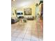 Bright living room featuring tile floors and neutral decor at 3250 Dellbrook Dr, Deltona, FL 32738