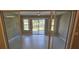 Sunroom with sliding glass doors and access to backyard at 32712 Timberwood Dr, Leesburg, FL 34748