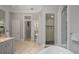 Spa-like bathroom with double vanity and shower at 3413 Lilas Ct, Windermere, FL 34786