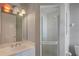 Small bathroom with shower and sink at 3413 Lilas Ct, Windermere, FL 34786