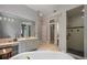 Elegant bathroom with soaking tub and walk-in shower at 3413 Lilas Ct, Windermere, FL 34786