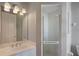 Clean bathroom with shower and single vanity at 3413 Lilas Ct, Windermere, FL 34786