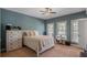 Charming bedroom with light walls and ceiling fan at 3413 Lilas Ct, Windermere, FL 34786