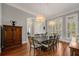 Spacious dining room with hardwood floors and large windows at 3413 Lilas Ct, Windermere, FL 34786