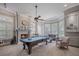 Game room with pool table and fireplace at 3413 Lilas Ct, Windermere, FL 34786