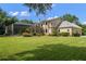 Stunning two-story home with metal roof and pool at 3413 Lilas Ct, Windermere, FL 34786