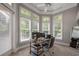 Home office with built-in desk and window views at 3413 Lilas Ct, Windermere, FL 34786