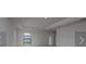 Bright bedroom with a window and door leading to the outside at 4284 Sagefield Drive, St Cloud, FL 34773