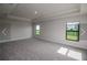 Spacious bedroom with neutral carpeting and large windows at 4284 Sagefield Drive, St Cloud, FL 34773