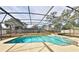 Inviting screened pool area with tiled deck at 438 Raymond Ave, Longwood, FL 32750