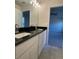 Double vanity bathroom with granite countertops and updated fixtures at 4486 Segafield, St Cloud, FL 34773