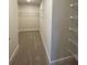 Spacious walk-in closet with wire shelving for ample storage at 4486 Segafield, St Cloud, FL 34773