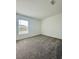 Bright and spacious bedroom with grey carpet at 4514 Cozy Condor Ct, Bartow, FL 33830