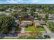 Aerial view of house, yard, and pool; located in a quiet neighborhood at 5405 Justine Way, Winter Park, FL 32792