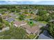 Aerial view of the community highlighting the verdant landscape and the convenient location at 5405 Justine Way, Winter Park, FL 32792