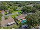 Aerial view showing home's location, pool, and surrounding neighborhood at 5405 Justine Way, Winter Park, FL 32792