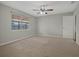 Spacious bedroom with carpet flooring and a ceiling fan at 5405 Justine Way, Winter Park, FL 32792