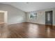 Bright living room featuring hardwood floors and neutral walls at 5405 Justine Way, Winter Park, FL 32792