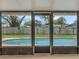 Relaxing screened pool area overlooking backyard at 5405 Justine Way, Winter Park, FL 32792