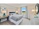 Guest bedroom with window and built-in shelving at 676 Kimber Ln # 37, Debary, FL 32713